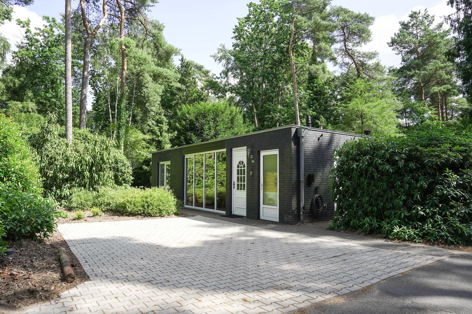 Vakantiewoning Eekhoorn in Lochem, gelijkvloers en rolstoelvriendelijk, gezien vanaf de oprit