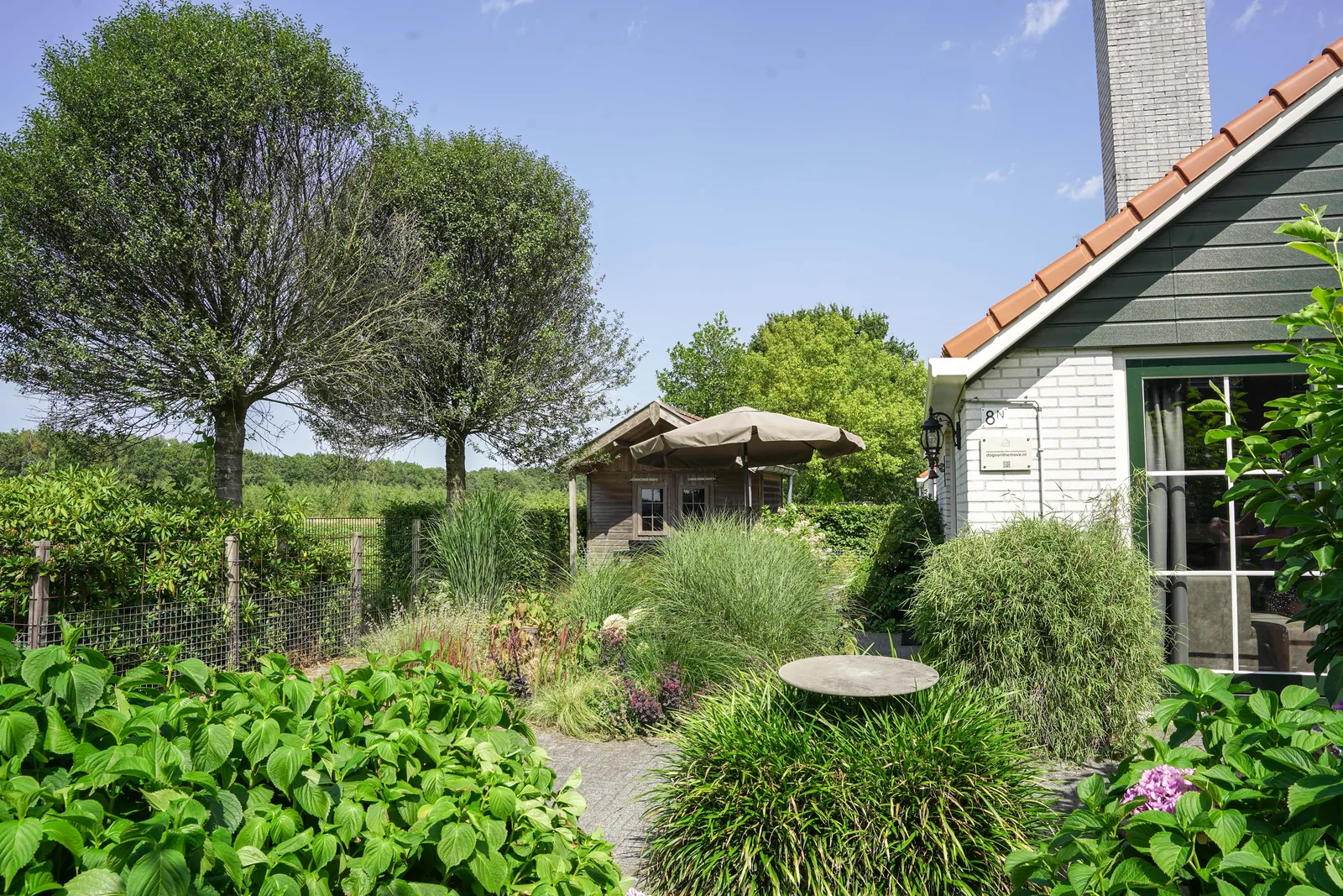 Omheinde tuin van Nachtegaal