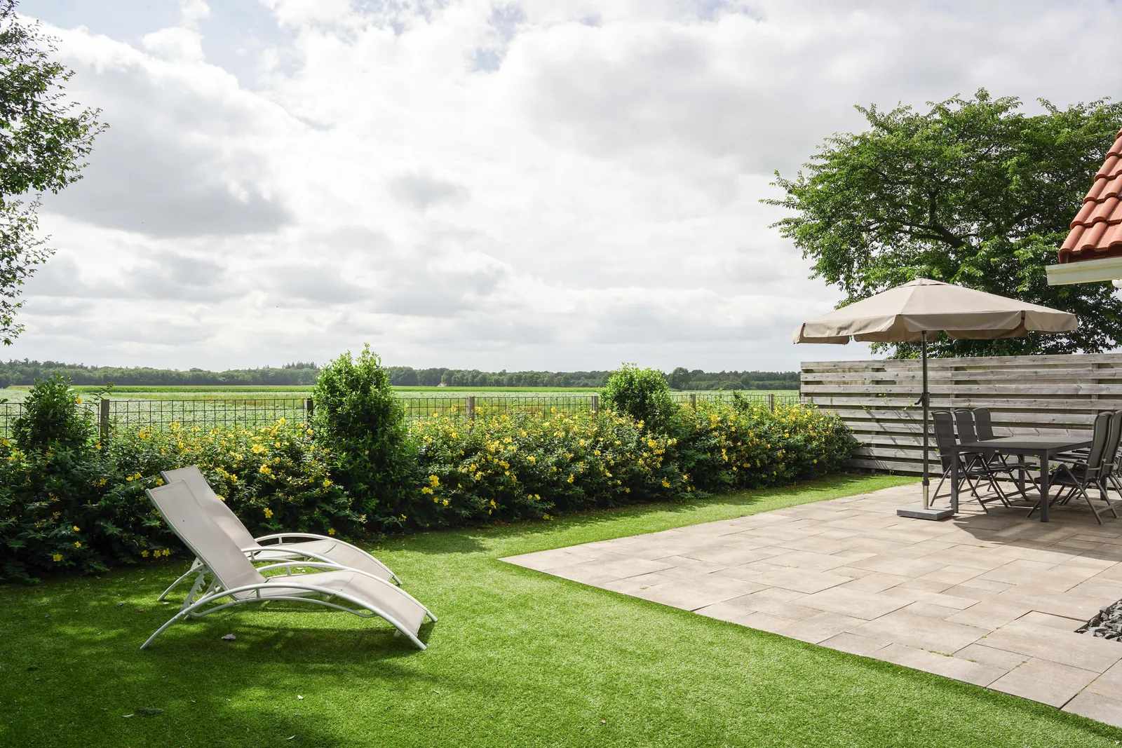 Omheinde tuin van Tapuit